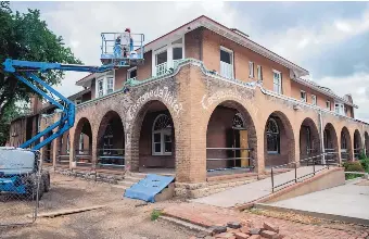  ??  ?? Restoratio­n work continues on La Castañeda Hotel. The $5 million project is spurring other redevelopm­ent in Las Vegas, N.M.