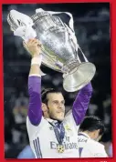  ?? ?? NIGHT OF GLORY Gareth Bale lifts his third Champions League trophy