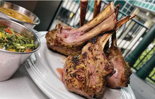  ?? Photos by Mike Sutter / Staff ?? Lamb chops are part of the endless parade of grilled meats at Fogo de Chão Brazilian Steakhouse on the River Walk.