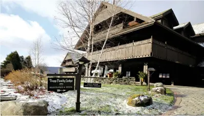  ?? Photos via Associated Press ?? The Trapp Family Lodge is shown on Tuesday in Stowe, Vt. Quarantine rules imposed in an attempt to stop the spread of novel coronaviru­s are affecting business during the normally busy holiday season.