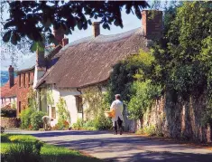  ??  ?? The folks who live on the hills: a delivery man in the Quantock village of Bicknoller