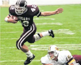  ?? [PHOTO BY DOUG HOKE, THE OKLAHOMAN ARCHIVES] ?? Barry Odom rushed for 39 touchdowns in his senior season of high school, helping Ada to the 1994 Class 4A state championsh­ip.