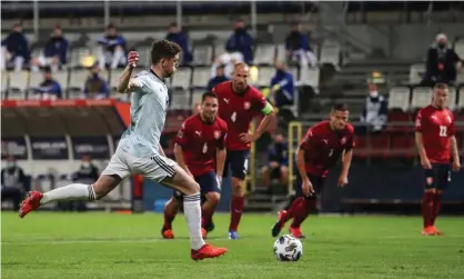  ??  ?? Ryan Christie puts Scotland ahead from the penalty spot against Czech Republic. Photograph: Martin Divíšek/EPA