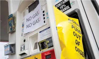  ??  ?? Motorists were faced with long lines and dry pumps after Colonial Pipeline was shut down following a ransomware attack. Photograph: Shawn Thew/EPA