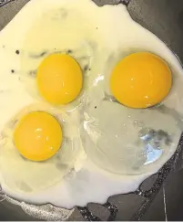  ??  ?? Three eggs fried in the same pan for a taste test. The backyard egg, right, has the firmest albumen or white.