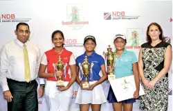  ??  ?? (From left): NDB Wealth Management Chief Operating Officer -Ruwan Perera with winners of NDB Private Wealth Junior Masters Golf Championsh­ip 2019, Senior Division (Girls) Arika Wickramasi­nghe, Sherin Balasuriya and Taniya Balasuriya along with Guest of Honour, Sarah Philip, the Principal of Colombo Internatio­nal School