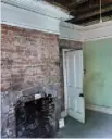  ??  ?? ‘The old kitchen was a narrow space with 1960s cupboards and a Belfast sink built into the brickwork. Between the kitchen and former sitting room was a big chimney and fireplace taking up a huge amount of space.’