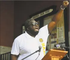  ?? Brian A. Pounds / Hearst Connecticu­t Media ?? Greg Johnson, president of the NAACP Naugatuck Valley branch, leads a chant of “Black Lives Matter” during a gathering of local ministers, political leaders and residents outside City Hall on Main Street in Ansonia on June 4.