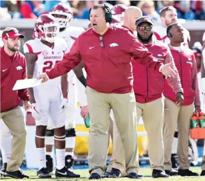  ?? GETTY IMAGES ?? Bret Bielema never gained traction in the rugged SEC West during a five- year coaching run at Arkansas.