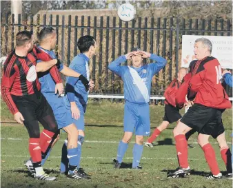  ??  ?? Plains Farm Alldec (stripes) take on Newcastle East End last week. Picture by Kevin Brady,