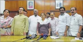  ?? RAJ K RAJ/HT ?? Congress leader Mallikarju­n Kharge (third from left), with the six Congress MPs who were suspended from the Lok Sabha for five days, at Parliament house in New Delhi on Wednesday.