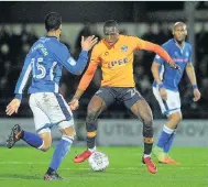  ?? Sean Hansford ?? ●●Joe Thompson challenges Ousmane Fane during Tuesday’s derby clash