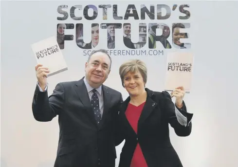  ??  ?? 0 Then First Minister Alex Salmond and his deputy, Nicola Sturgeon, unveil the White Paper ahead of the 2014 referendum