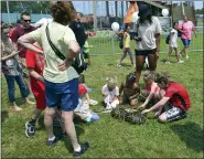  ??  ?? Audience members got to do a meet-and-greet with Stretchy the python out on the grass after the show.