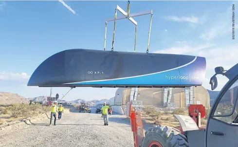  ??  ?? A Hyperloop One test vehicle is transporte­d at a DevLoop track in the Nevada Desert in this photo taken on May 12, 2017.