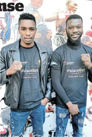  ?? /JEFF ELLIS ?? Thulani Mbenge and Jabulani Makhense came face-to-face yesterday after signing on the dotted line for their showdown at Emperors Palace in June.