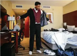  ?? Karen Warren / Houston Chronicle ?? Should Texas A&amp;M defensive end Myles Garrett win the Rotary Lombardi Award today, he will do so in style after a tuxedo fitting on Friday.