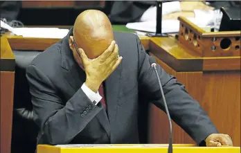  ?? Picture: EPA ?? UNDER FIRE ... AGAIN: President Jacob Zuma was confronted by rowdy MPs from the Economic Freedom Fighters during question time in Parliament yesterday. Questions were raised over the money spent on upgrades to his Nkandla home, SA’s failure to arrest...