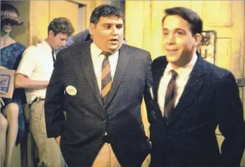  ?? Universal ?? HAPLESS FRATERNITY PLEDGE Stephen Furst, left, and Tom Hulce in the landmark comedy “Animal House.” Furst played the overweight and socially awkward “Flounder” Dorfman, and Hulce portrayed his friend “Larry” Kroger.