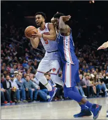  ?? MICHAEL PEREZ/AP PHOTO ?? New York’s Courtney Lee draws a foul from the 76ers’ Joel Embiid in the first half of Monday’s game in Philadelph­ia. The 76ers won, 108-92.