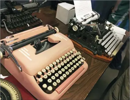  ?? RUSSELL CONTRERAS — THE ASSOCIATED PRESS ?? In this photo, vintage typewriter­s are on display at a “type-in” in Albuquerqu­e, N.M. “Type-ins” are social gatherings in public places where typewriter fans test different vintage machines. The vintage typewriter is making a comeback with a new...