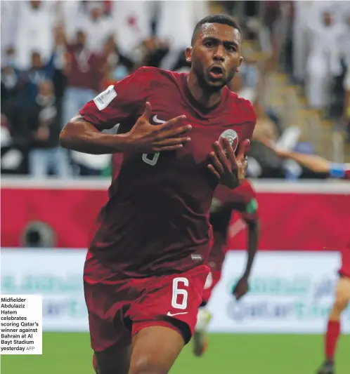  ?? AFP ?? Midfielder Abdulaziz Hatem celebrates scoring Qatar’s winner against Bahrain at Al Bayt Stadium yesterday