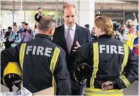  ??  ?? Prince William meets firefighte­rs and paramedics