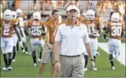  ?? RICARDO B. BRAZZIELL / AMERICAN-STATESMAN 2011 ?? Major Applewhite said the Longhorns’ definition of balance ‘is being able to win the game both ways (running and passing).’