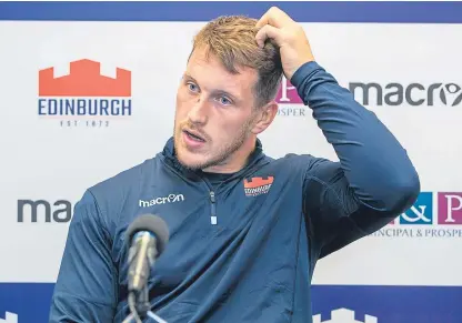  ?? Pictures: SNS. ?? Mark Bennett hopes improving his game in Scott partnershi­p can put him back in Scotland frame.