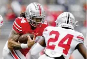  ?? ASSOCIATED PRESS ?? Running back Marcus Crowley, a four-star prospect who showed promise, won’t play again, Ohio State coach Ryan Day announced Friday.