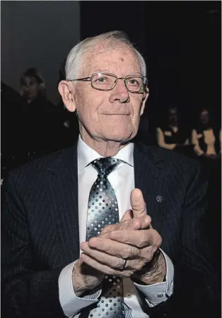  ?? JESSICA NYZNIK/EXAMINER ?? Morris Cox, founder of Brant Basics, applauds during the Greater Peterborou­gh Chamber of Commerce Business Excellence Awards at Showplace Performanc­e Centre in Peterborou­gh, Ont. on Wednesday night. Cox won the Business Citizen of the Year award.