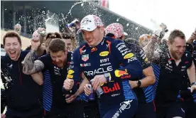  ?? ?? Red Bull's Max Verstappen celebrates with his team after winning the Japanese Grand Prix. Photograph: Issei Kato/Reuters