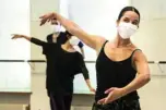  ??  ?? Dancers of the Ballet du Rhin wear protective face masks during a training session in Mulhouse, eastern France.