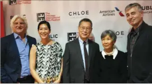  ?? JIAN PING / FOR CHINA DAILY ?? Abacus:SmallEnoug­htoJail filmmakers and those whose story was featured in the movie attend the 52nd Chicago Internatio­nal Film Festival. From left: producer Mark Mitten; Sung family members Vera, Thomas and Hwei Lin; and director Steve James.