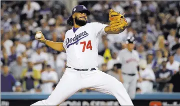  ?? Matt Slocum ?? The Associated Press Dodgers closer Kenley Jansen gave up one run in the eighth inning and the game-tying run in the ninth to blow a save in the postseason for the first time Wednesday in Game 2 of the World Series in Los Angeles.