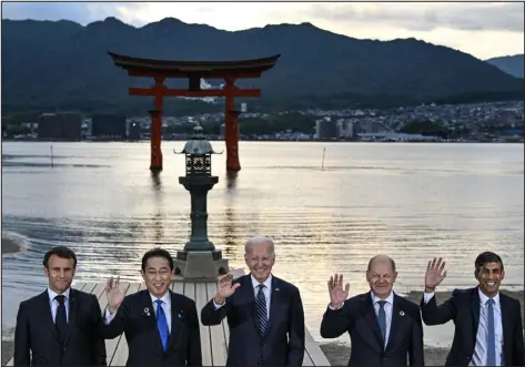  ?? KENNY HOLSTON — THE NEW YORK TIMES ?? President Joe Biden, center, and other world leaders gathered for the G7 summit, during a photo session at Itsukushim­a Shrine on Miyajima Island, Hatsukaich­i, Japan, on Friday. From left: French President Emmanuel Macron, Japanese Prime Minister Fumio Kishida, Biden, German Chancellor Olaf Scholz, and U.K. Prime Minister Rishi Sunak.