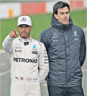  ??  ?? Making a point: Toto Wolff (right) is happy with Lewis Hamilton’s preparatio­ns