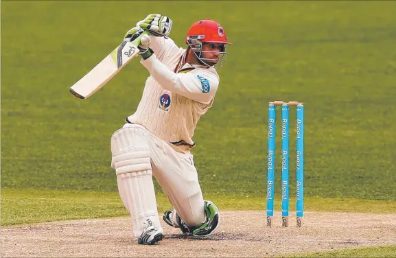  ?? Picture: MICHAEL DODGE ?? Redbacks opening batsman Phillip Hughes smashes a cover boundary during his innings of 103 against Victoria at the MCG yesterday