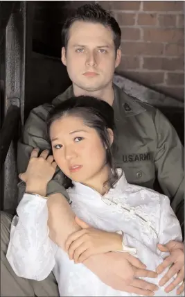  ?? Jordan Harris photo ?? Cooper Cerulo as Chris, with Sara LaFlamme as Kim, in the Encore Repertory production of “Miss Saigon,” at Woonsocket’s Stadium Theatre May 6 to 8.