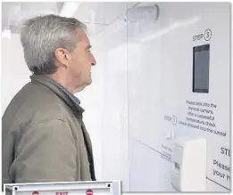  ??  ?? US SPRAY Tony Banks visits the new Covid-beating system that will go on trial