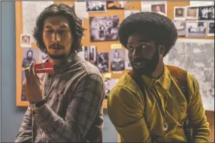  ?? The Associated Press ?? MUST SEE: Adam Driver, left, and John David Washington in a scene from "BlacKkKlan­sman."