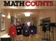  ??  ?? Junior High East students Cole Kratz (seventh grade), Michael Perry (seventh grade), Tyler Mort (eighth grade), and Cameron Kratz (seventh grade) recently competed at the MATHCOUNTS state level competitio­n.