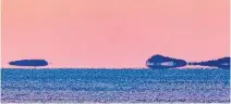  ?? BARRY BURGESS PHOTO ?? Queensland, N.S., Shut-in Island appeared to be levitating over the ocean.