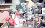  ?? ?? Displaced Haitians fleeing gang violence taking shelter in Port-au-prince