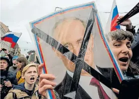  ?? AFP ?? No!. La foto repudiada de Putin en la marcha de San Petersburg­o