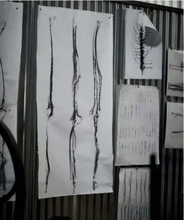  ??  ?? LEFT TO RIGHT
Many of Conrad Hicks’ ideas start as charcoal renderings before they become models and final sculptures; Caro Jesse and Hicks in the workshop, which houses his extensive collection of vintage machines and tools