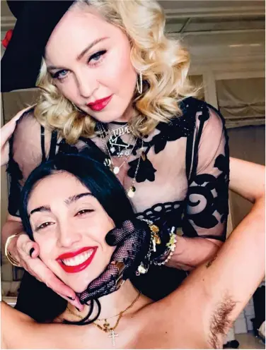  ??  ?? Statement: Lourdes reveals underarm hair in a photo with Madonna yesterday