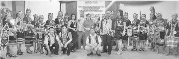  ??  ?? Nogeh (standing 10th left), his wife Datin Caroline Jonathan Sabai (standing 11th left) and Minos (standing front 2nd right) with the Sino Borih Sangon (Beauty Priestesse­s) and Sama Pogan (Brave Priests) contestant­s.