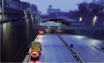  ??  ?? The long straight approach to the Kingsway Tunnel; why didn’t police spot the female figure sooner?