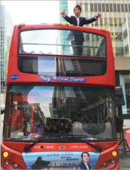  ?? CHINA DAILY ?? Chinese pianist Lang Lang on New York City’s Ride of Fame, on Tuesday in New York.